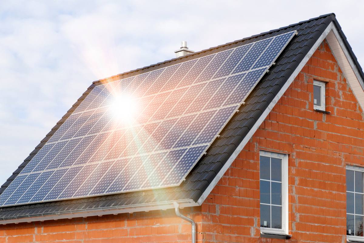 Home with solar panels on its roof